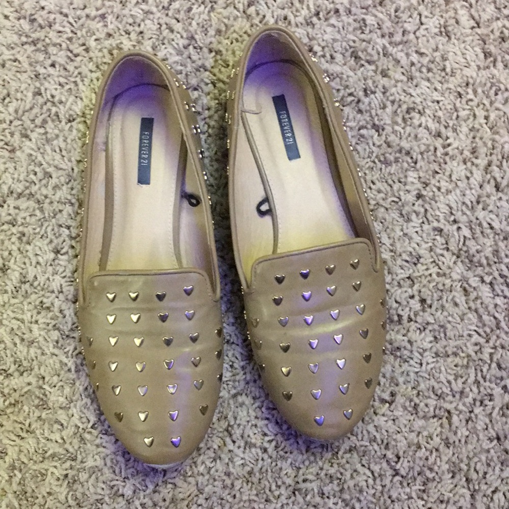 Heart-Studded flats with a 1-inch heel